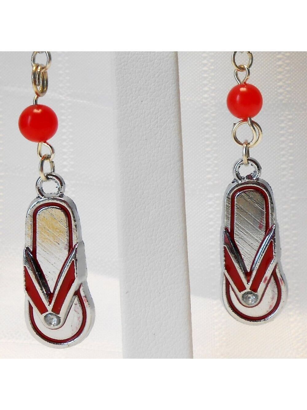 No 734 Handmade earrings with enameled silver shoes charms